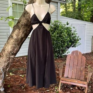 Black cut-out dress by into.  All cotton and super cute. Size 8. 🖤